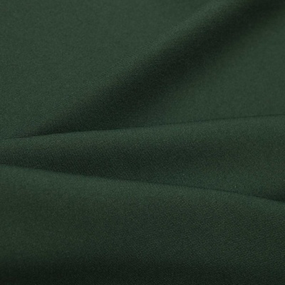 Ткань костюмная 21010 2076, 225 гр/м2, шир.150см, цвет т.зеленый - купить в Рыбинске. Цена 394.71 руб.